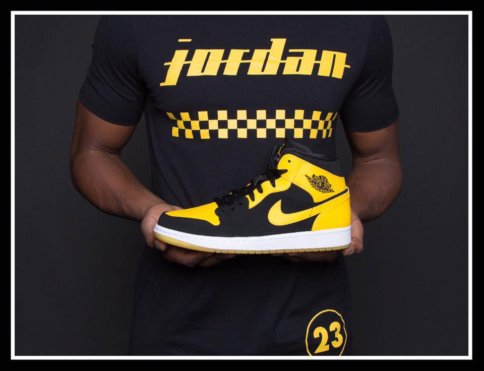 jordan black and yellow shirt
