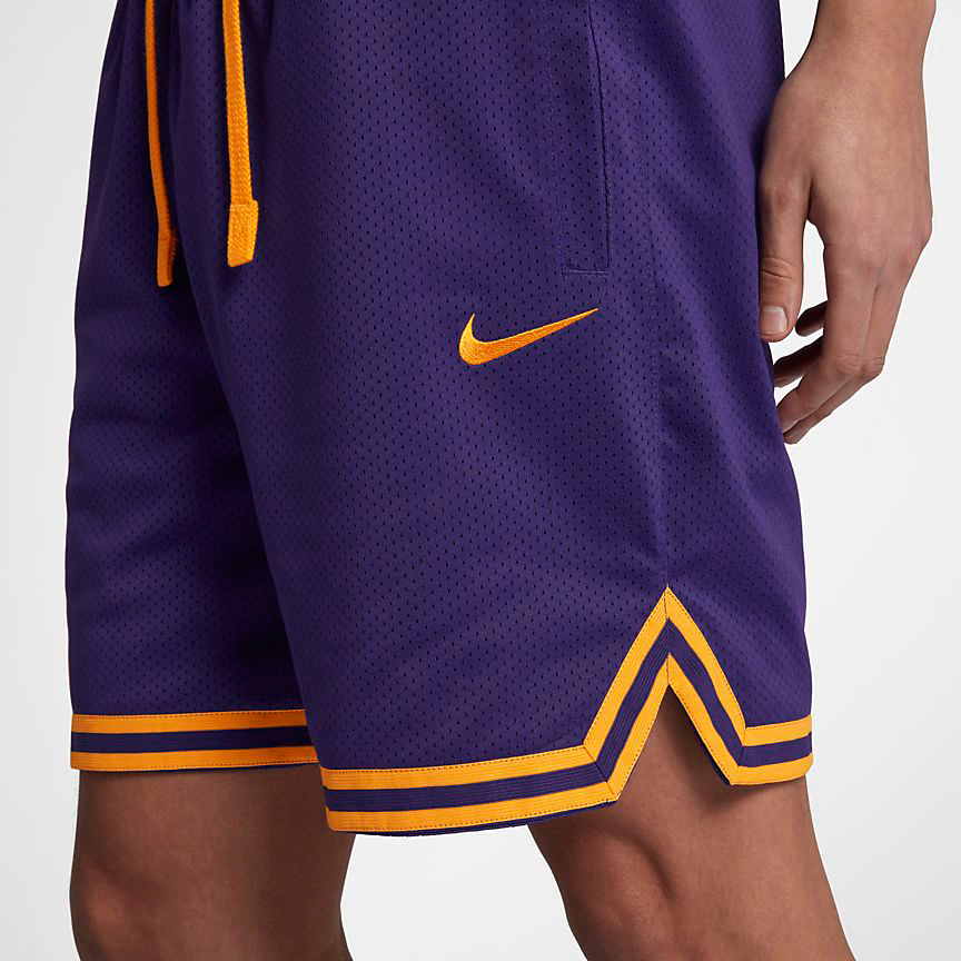 purple and yellow nike shorts