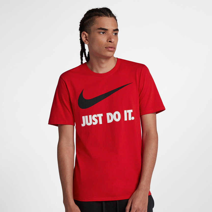 red nike shirt with white swoosh