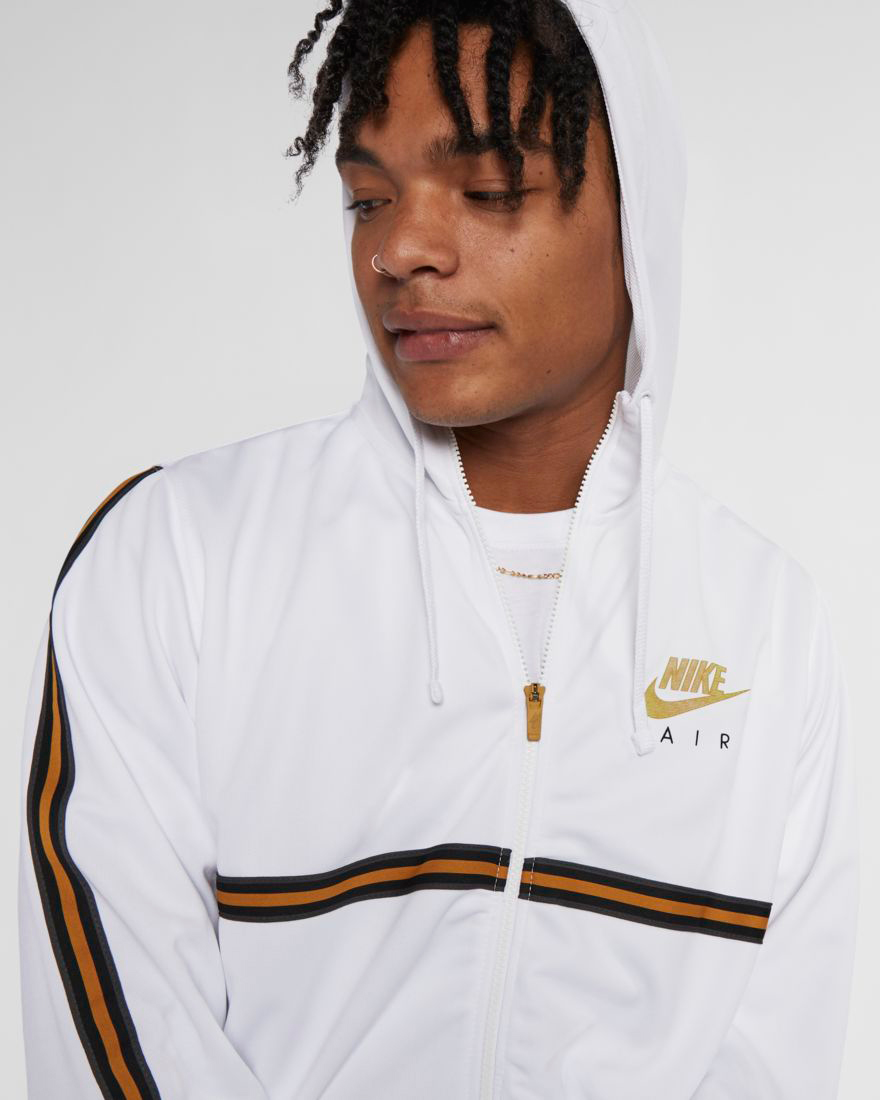 white nike hoodie with gold swoosh