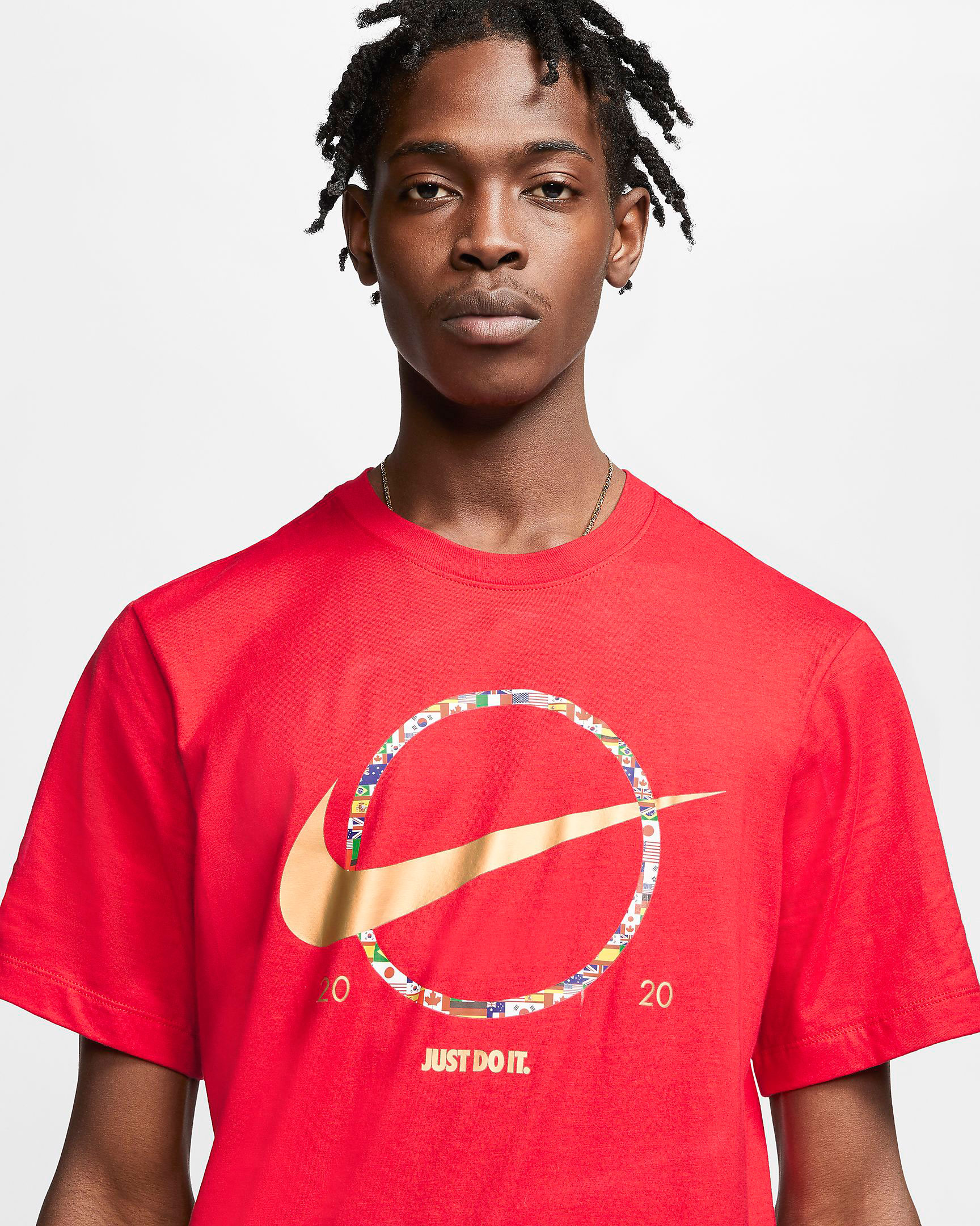 gold and red nike shirt