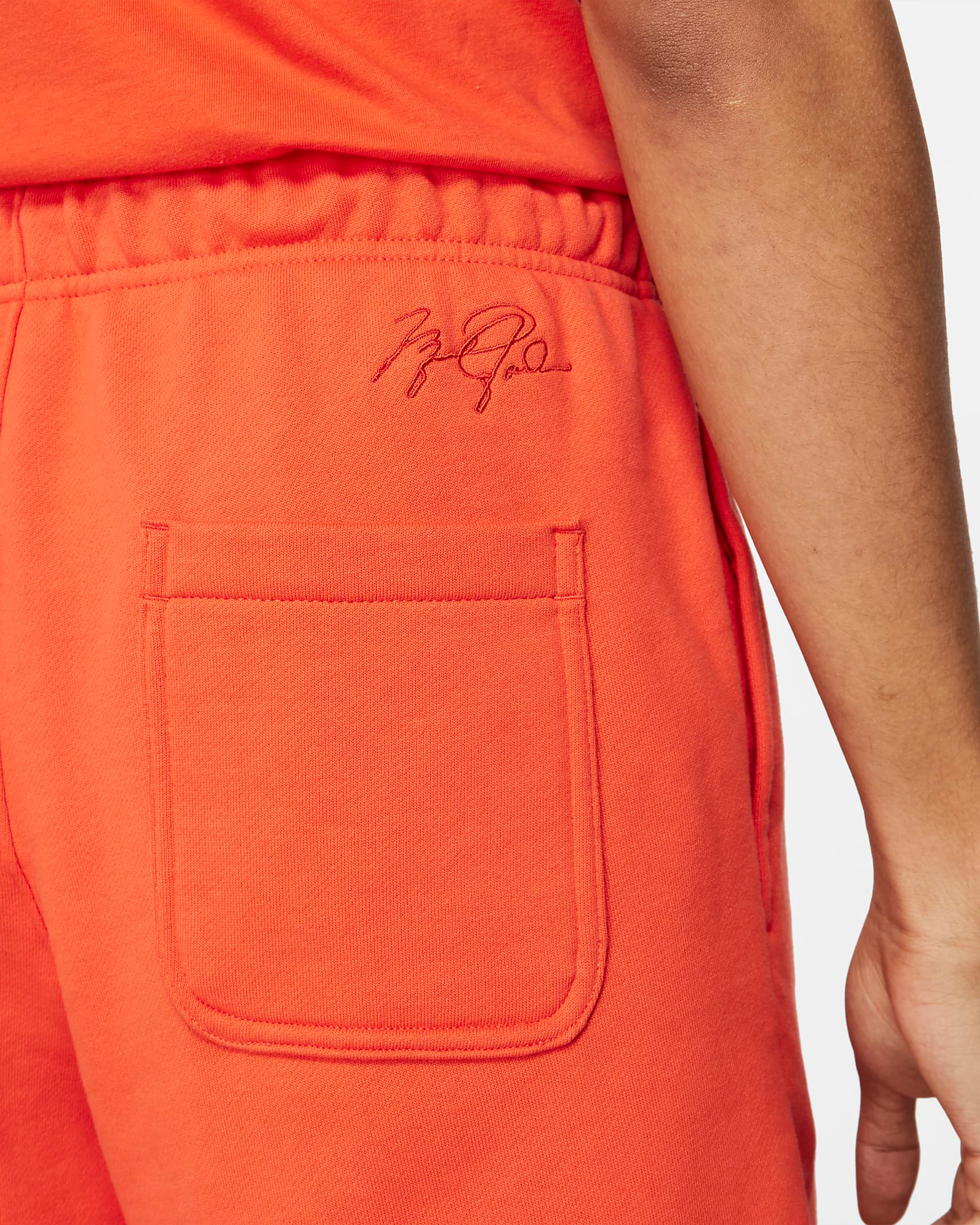 jordan-orange-essential-fleece-shorts-4
