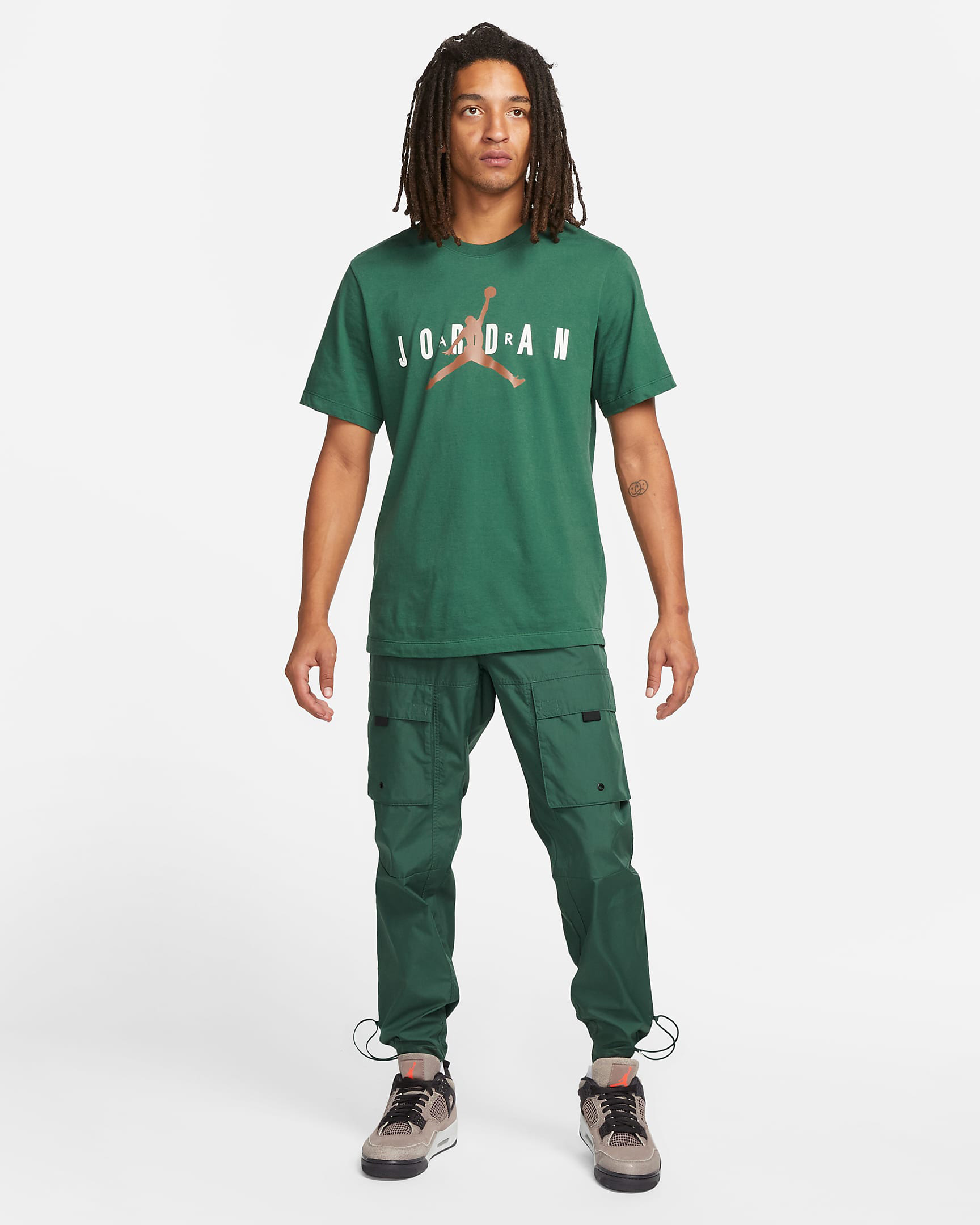 jordan-noble-green-t-shirt-pants-outfit