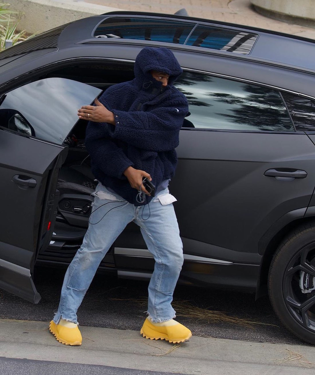 Kanye-West-wearing-adidas-Yeezy-Knit-Runner-Boot-Sulfur