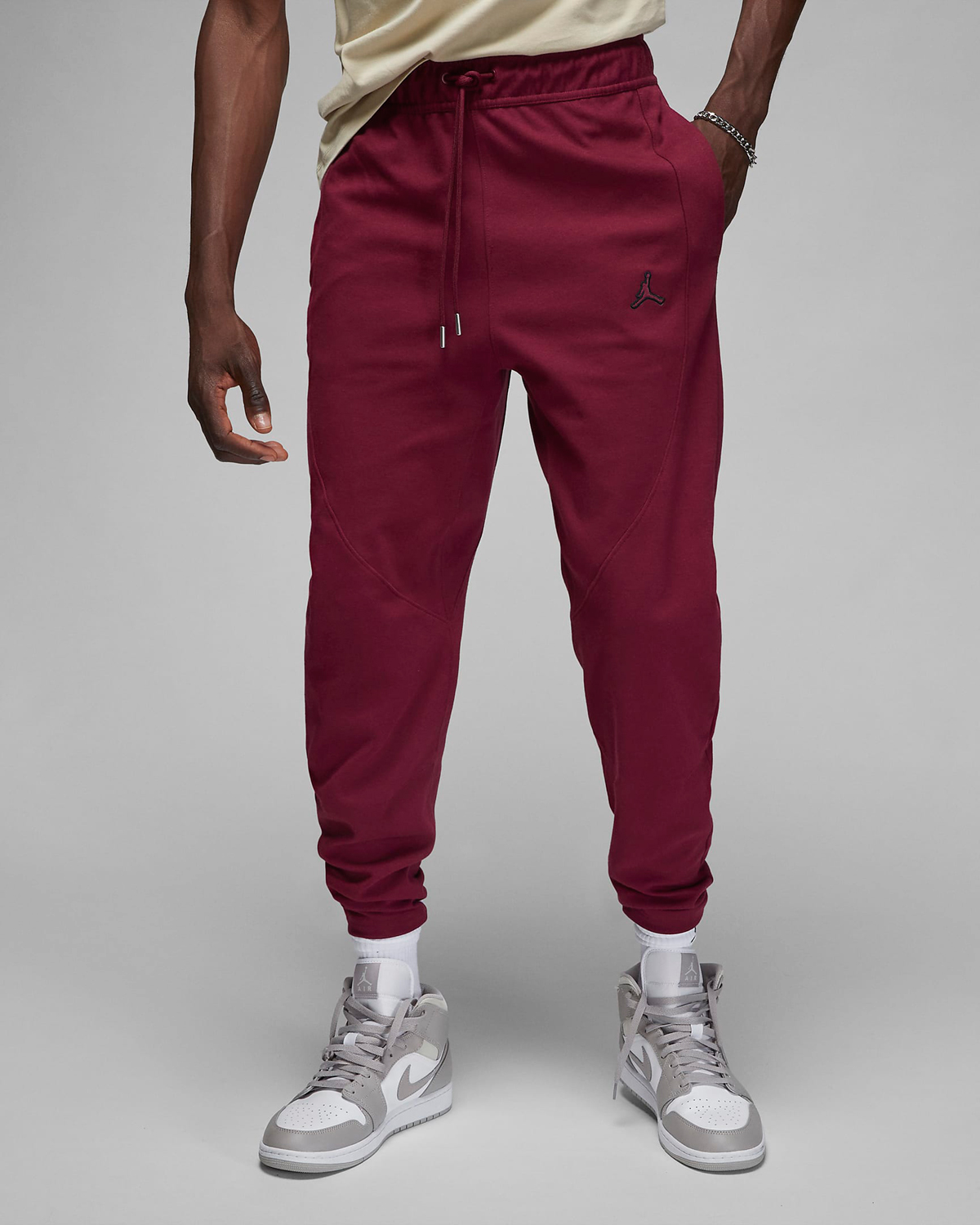 Jordan-Essentials-Warmup-Pants-Cherrywood-Red