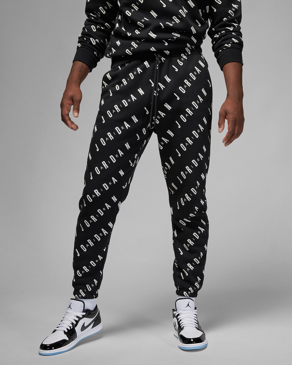 Jordan-Essentials-Graphic-Fleece-Pants-Black-White