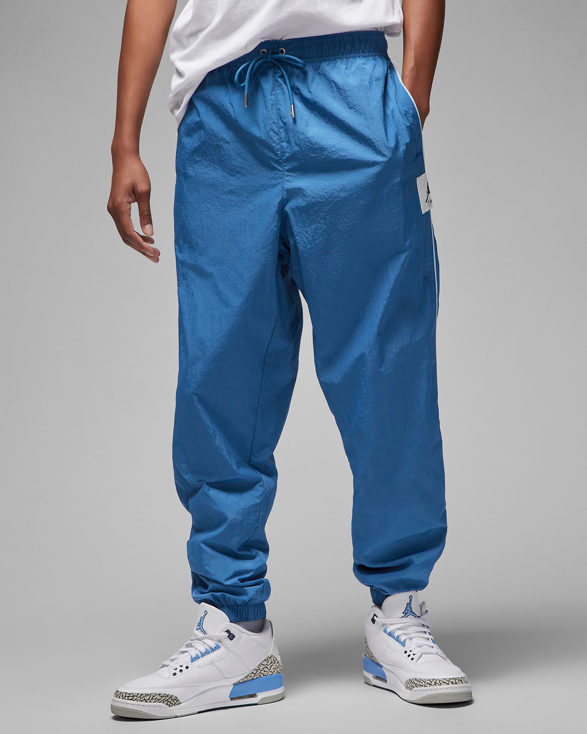 Jordan-Essentials-Warm-Up-Pants-True-Blue-1