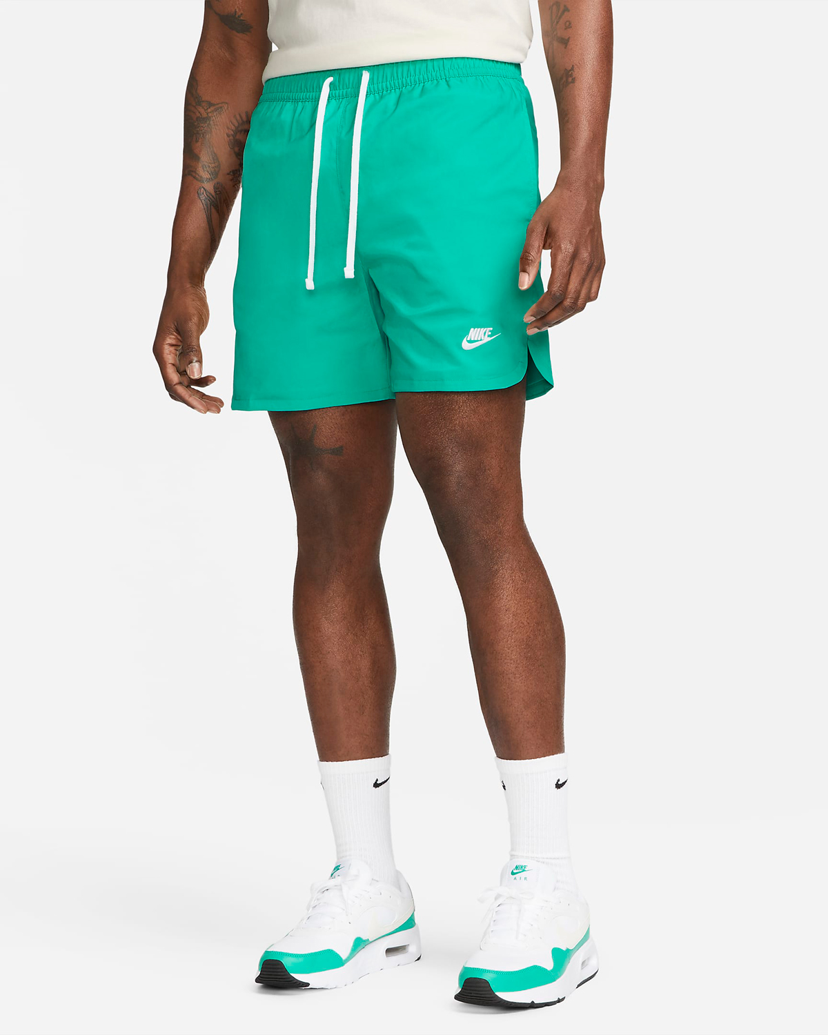Nike-Sportswear-Essentials-Woven-Flow-Shorts-Clear-Jade-1