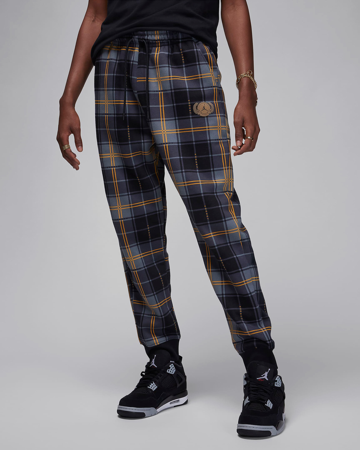 Jordan-Essentials-Holiday-2023-Plaid-Fleece-Pants-Black-Gold-1