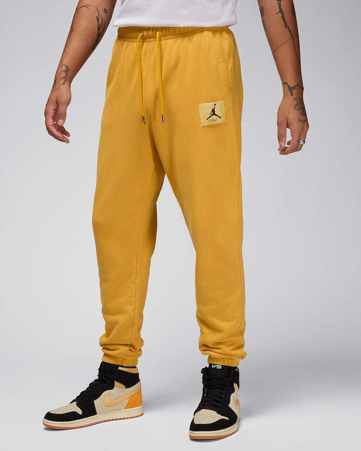 Jordan-Essentials-Fleece-Washed-Pants-Yellow-Ochre