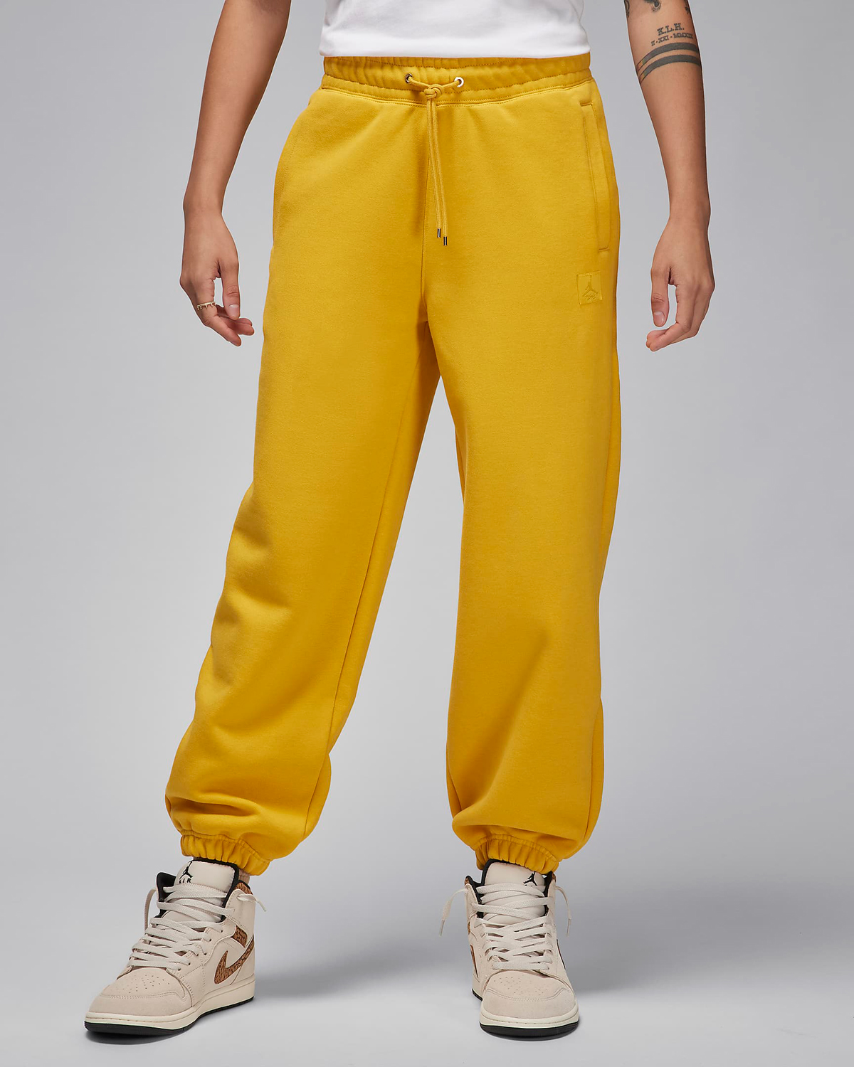 Jordan-Flight-Fleece-Womens-Pants-Yellow-Ochre-1