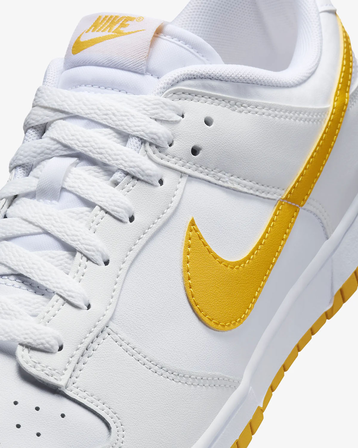 Following a first look at Nike's newest Blazer Low in two upcoming White University Gold 7