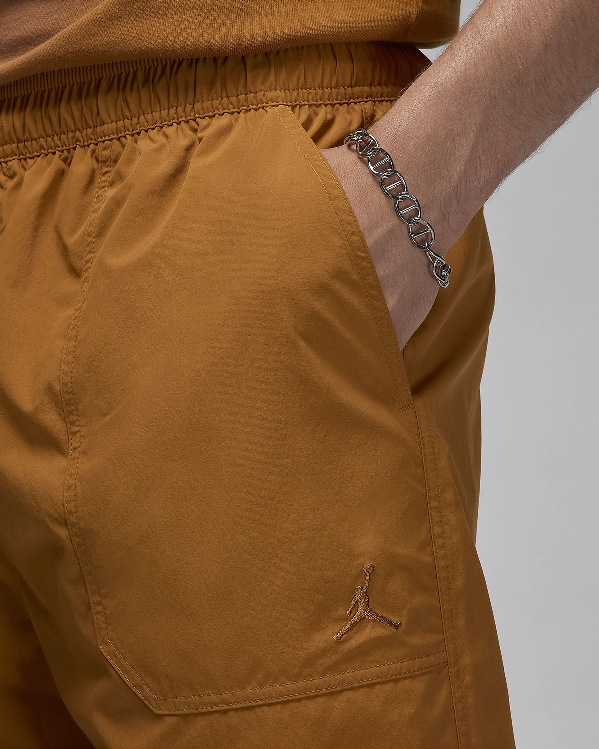 Jordan Essentials Woven Pants Desert Bronze 3