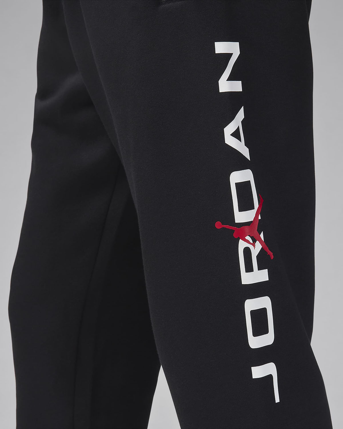 Jordan Essentials Fleece Joggers Black White Red 3