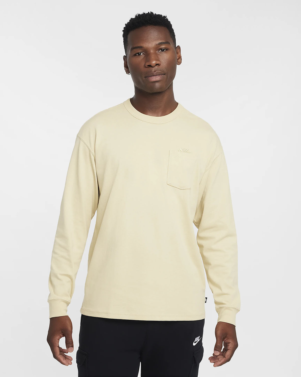 Nike Sportswear Mens Premium Essentials Long Sleeve Pocket T Shirt Team Gold