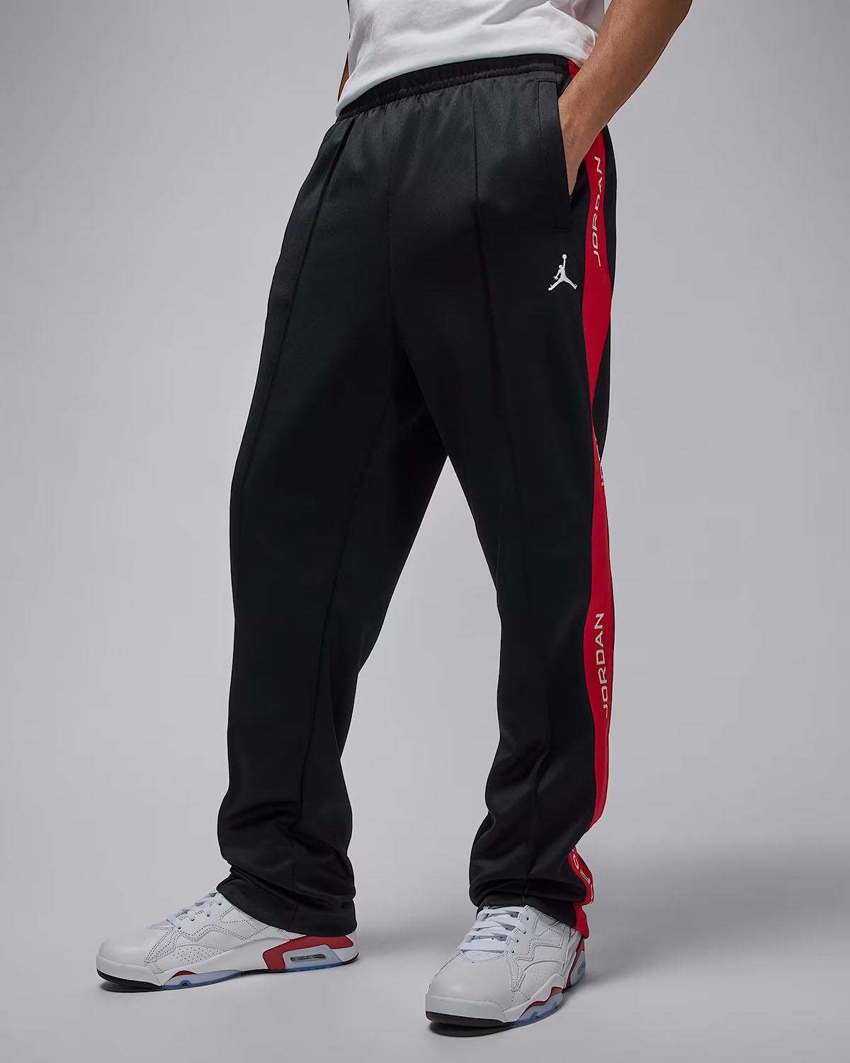 Jordan Essential Mens Track Suit Pants Black Red 1