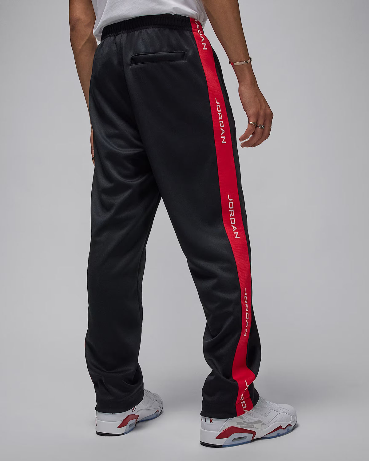 Jordan Essential Mens Track Suit Pants Black Red 2