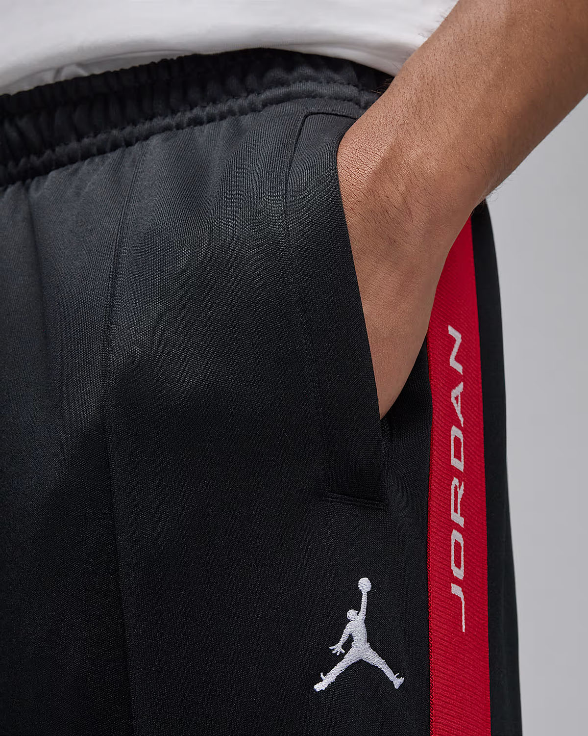 Jordan Essential Mens Track Suit Pants Black Red 3