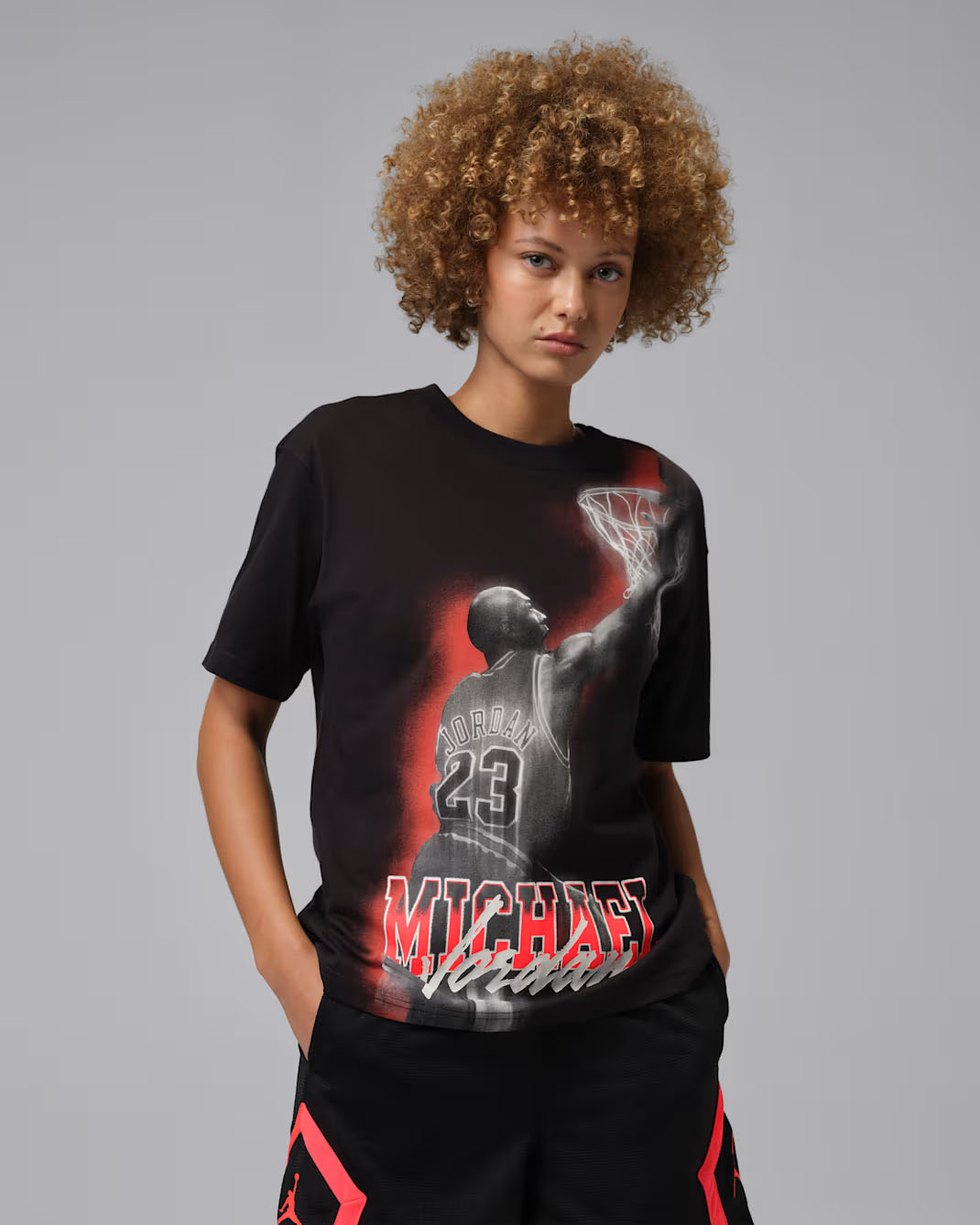 Jordan Sport Heritage Women's Dri-FIT Graphic T-Shirt Black Infrared 1