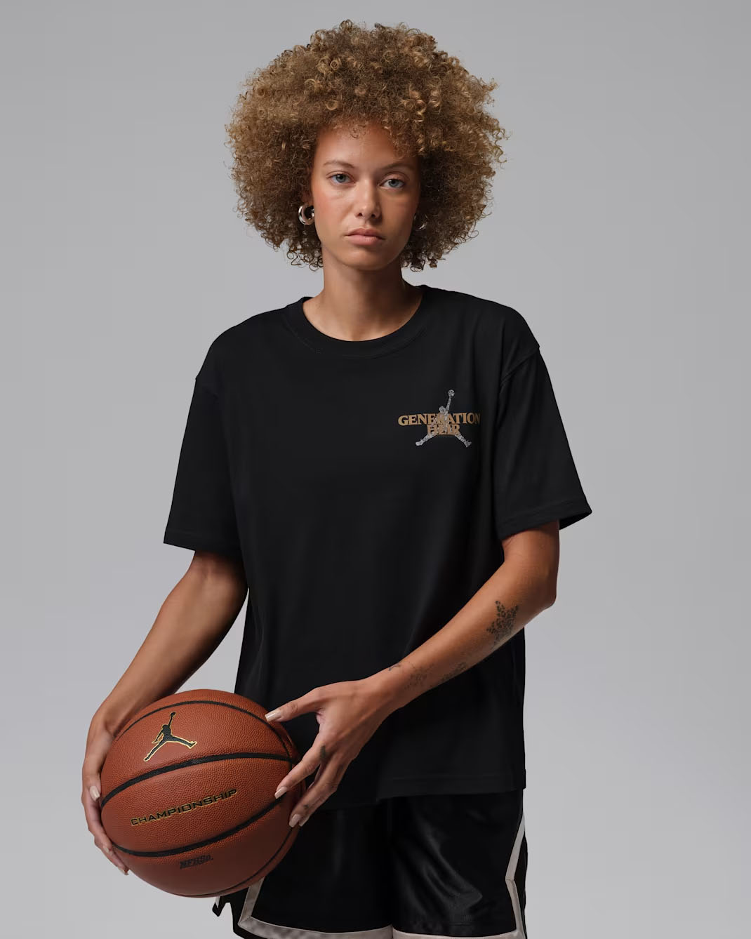 Jordan Sport Women's Graphic T Shirt Black Metallic Gold 1