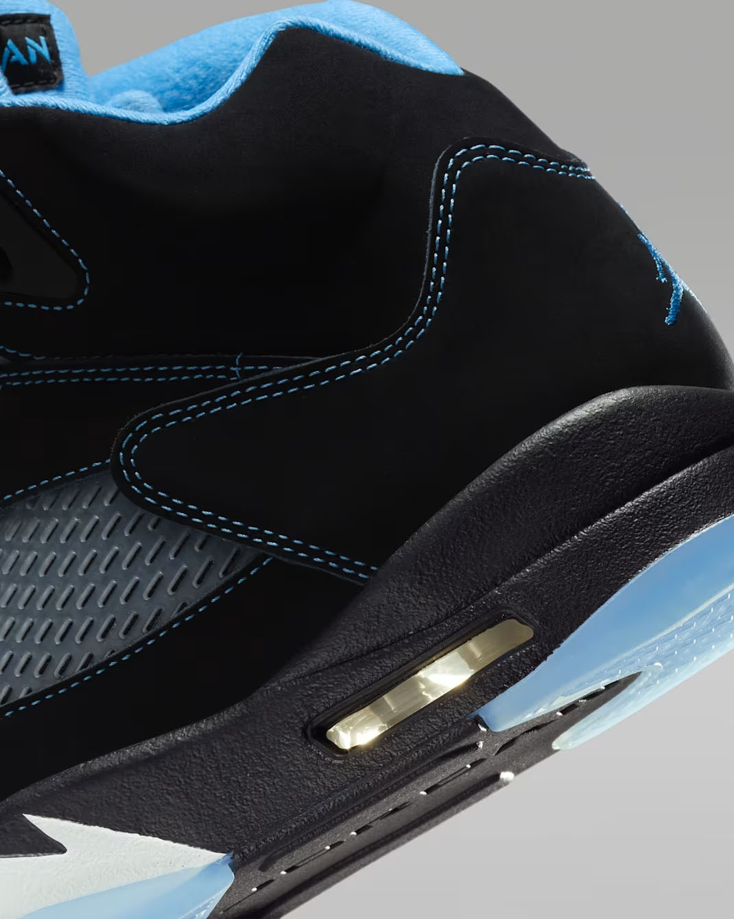 Air Jordan 5 Black UNC University Blue 2026 Midsole Heel Close Up View