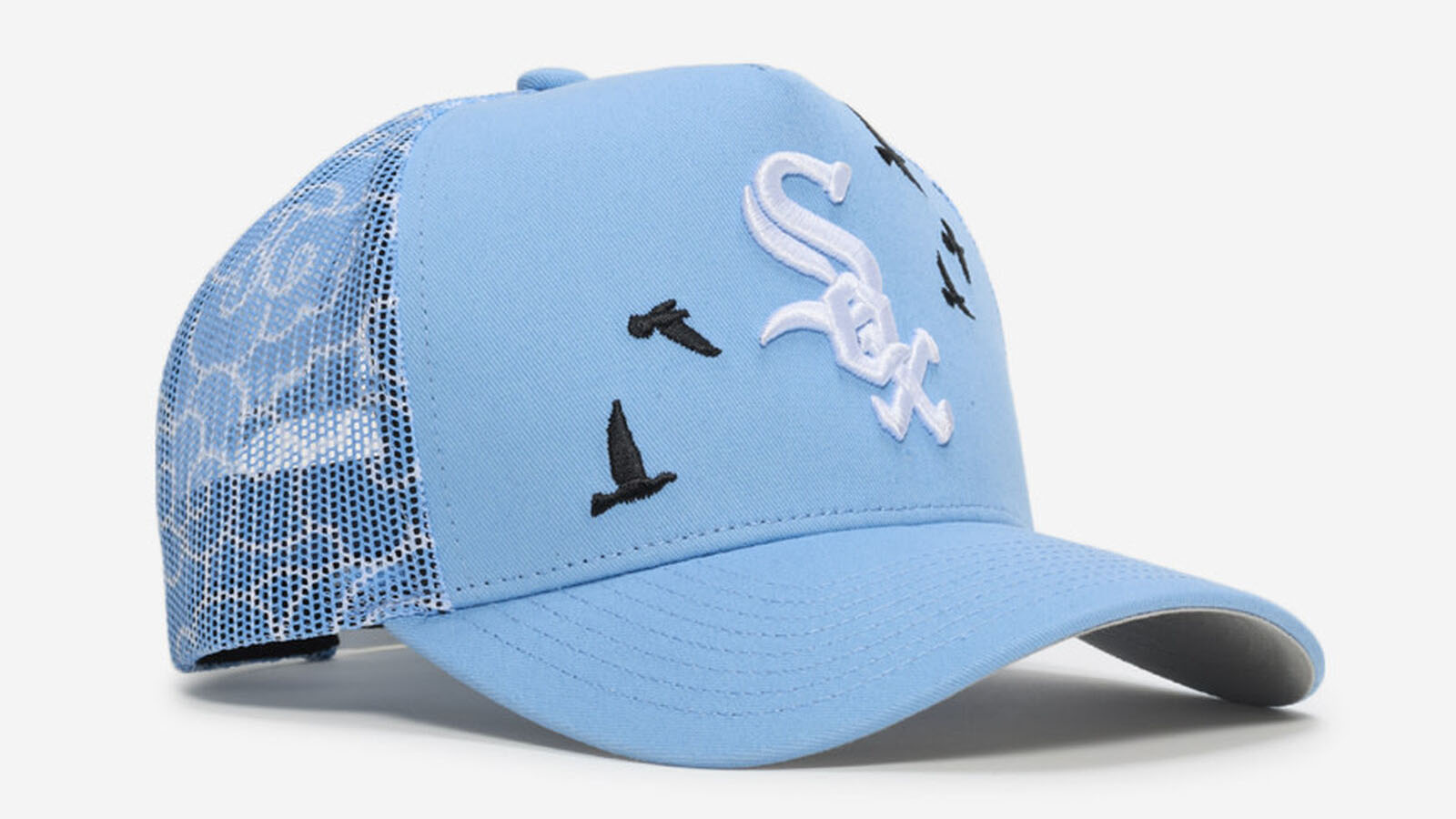Chicago White Sox Mitchell & Ness Trucker Clouds Snapback Hat in Carolina Blue and white to match the Air Jordan 5 Black Carolina 2026 sneakers.