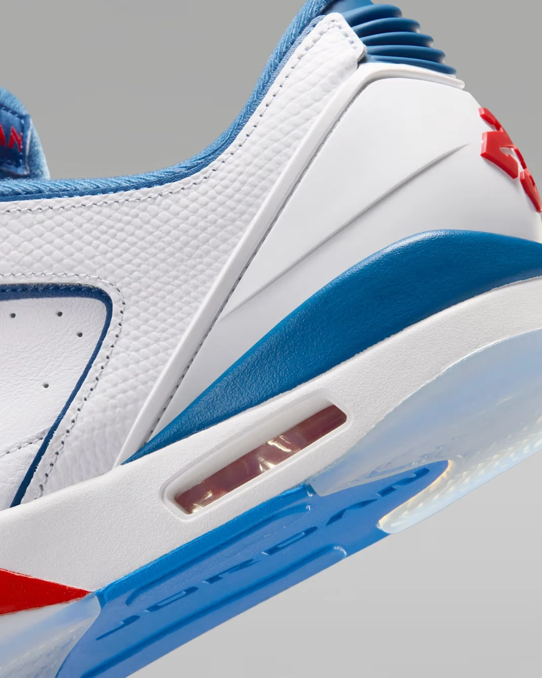 Close-up of the Jordan Sixty Plus Low "True Blue" heel with visible Air cushioning.