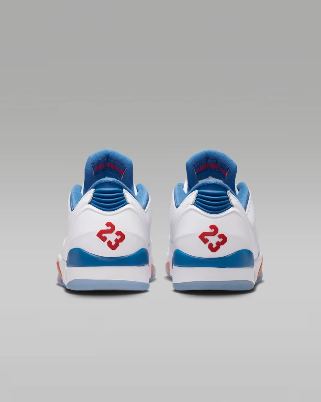 Heel view of the Jordan Sixty Plus Low "True Blue" sneakers with red 23 branding.