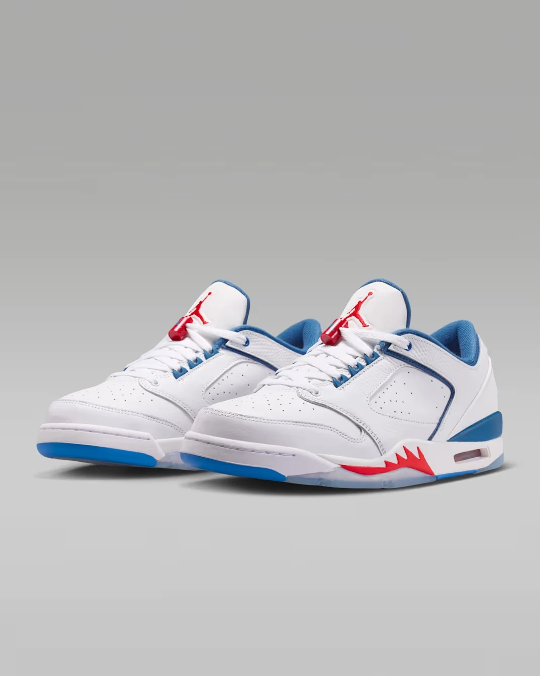 Pair of Jordan Sixty Plus Low "True Blue" sneakers viewed from the front angle.