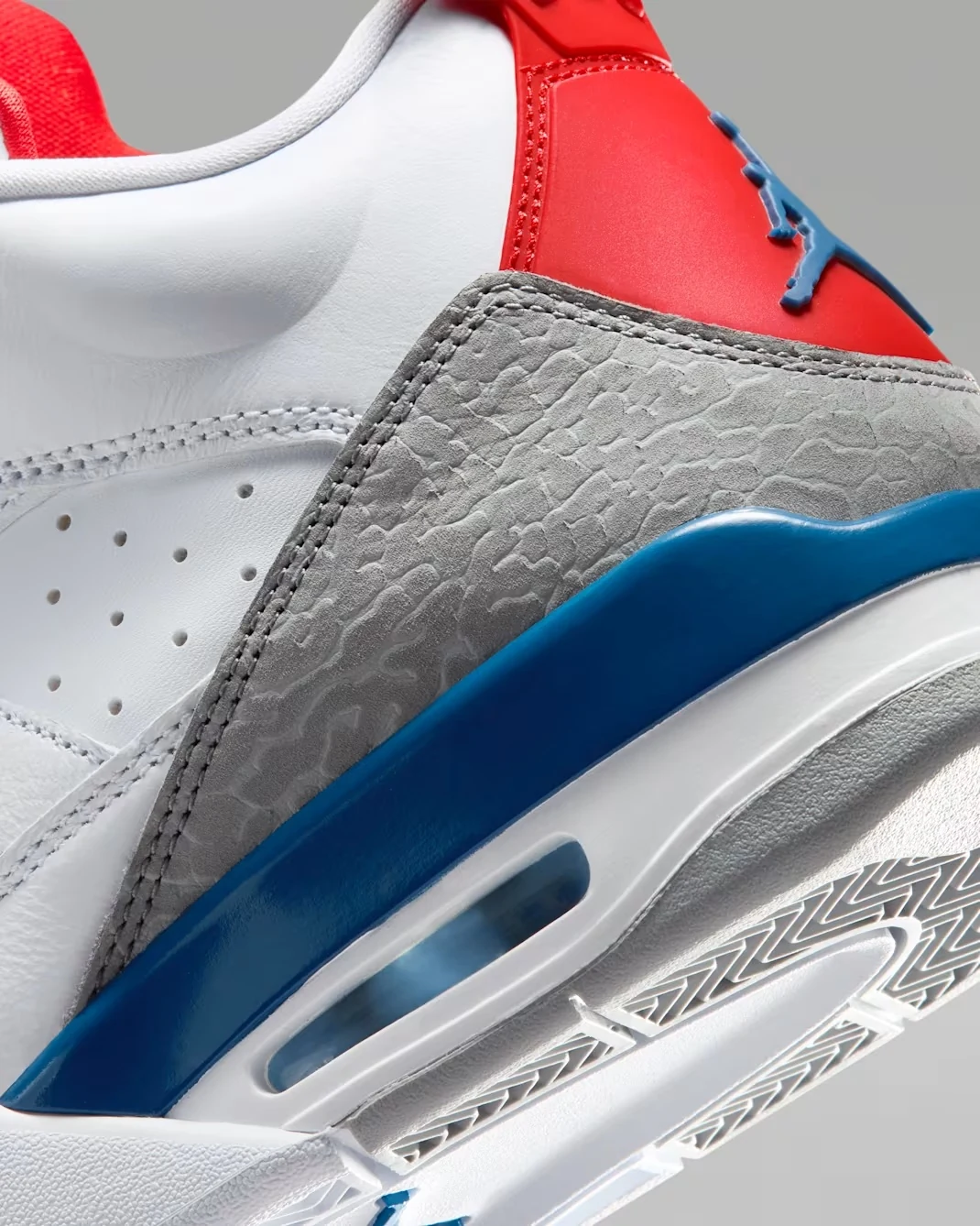 Close-up of the elephant print overlay and visible Air unit on the Jordan Son of Mars Low "True Blue."