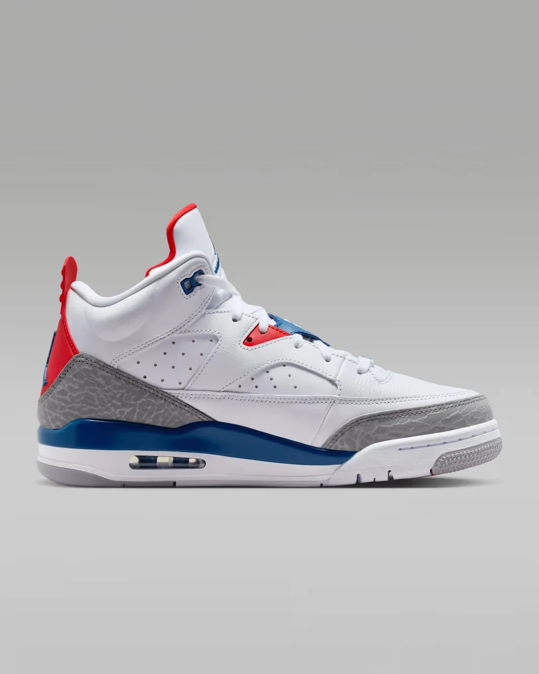 Lateral side view of the Jordan Son of Mars Low "True Blue" featuring White leather with True Blue, Cement Grey and Varsity Red accents.