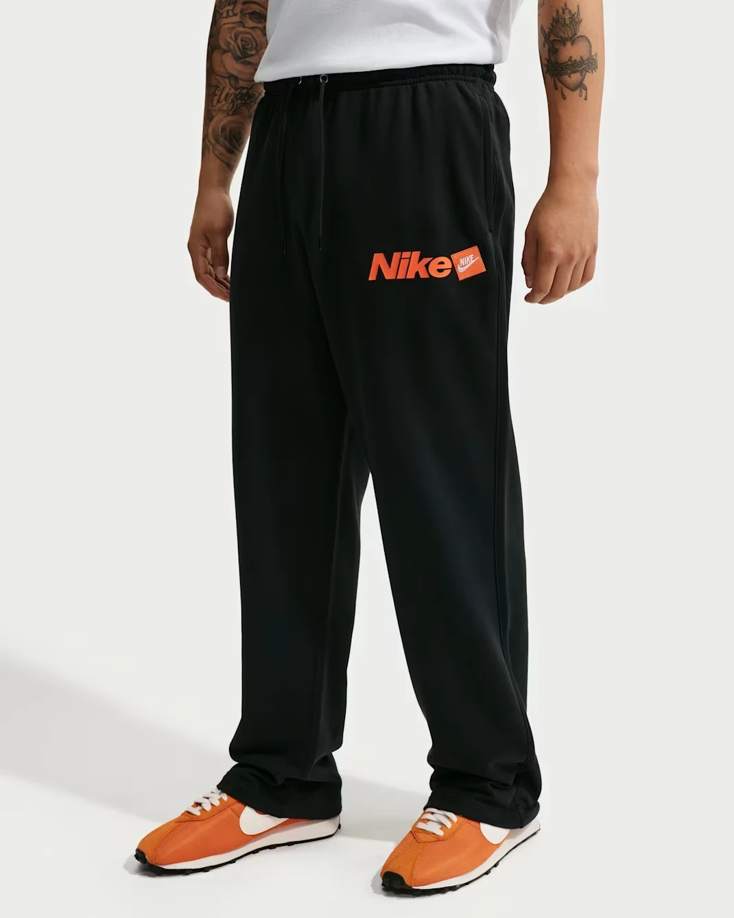 Nike Sportswear Club Open-Hem French Terry Pants in Black.