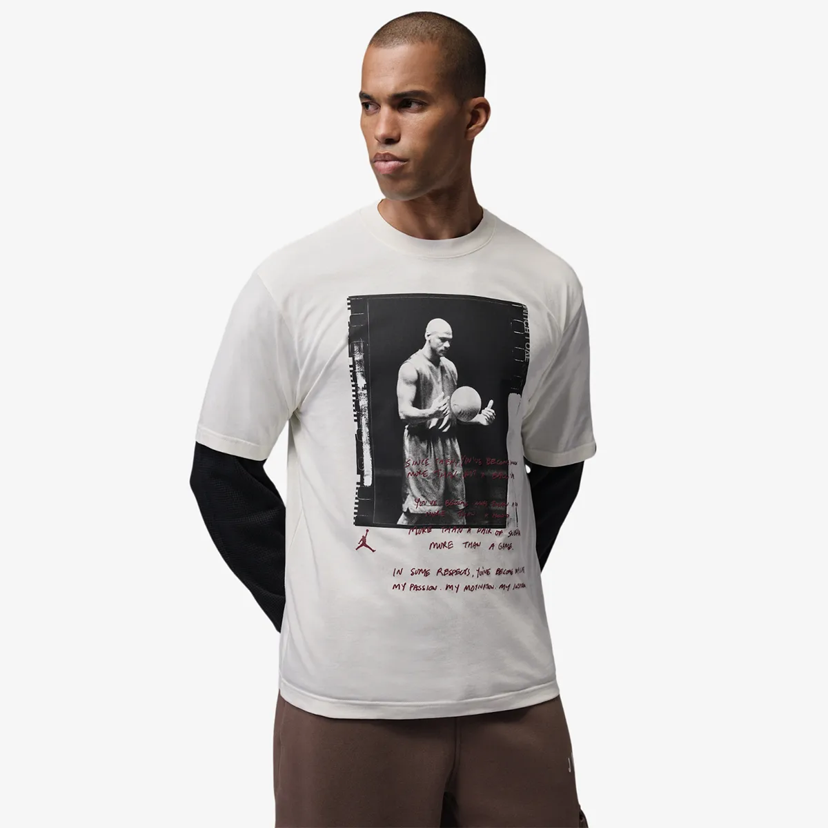Model wearing the Jordan Brooklyn Love Letter Photo T-Shirt in Soft Pearl from the front with vintage Michael Jordan graphic.