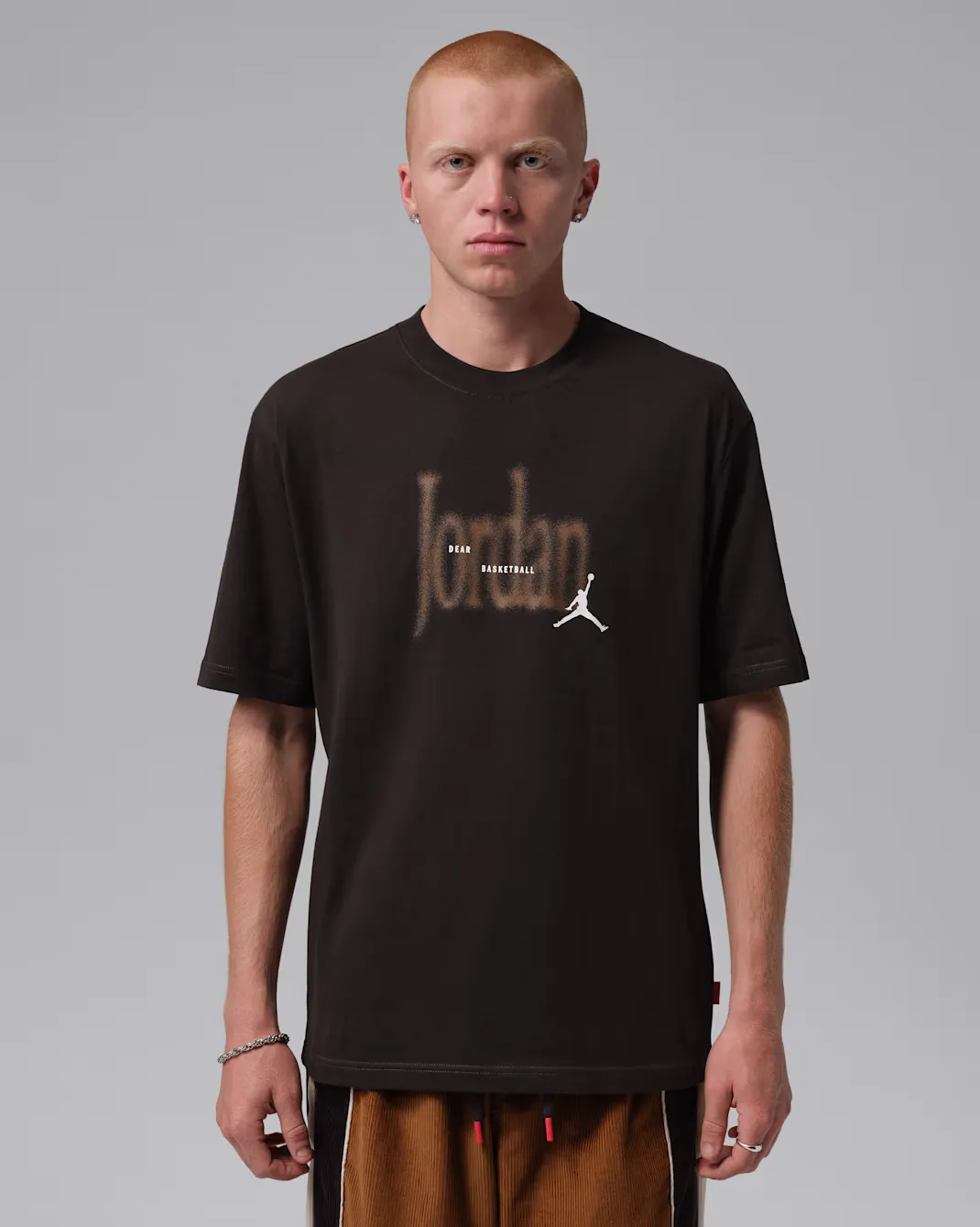Front view of the Jordan Brooklyn Love Letter T-Shirt in Shadow Brown with Dear Basketball graphic and Jumpman logo.