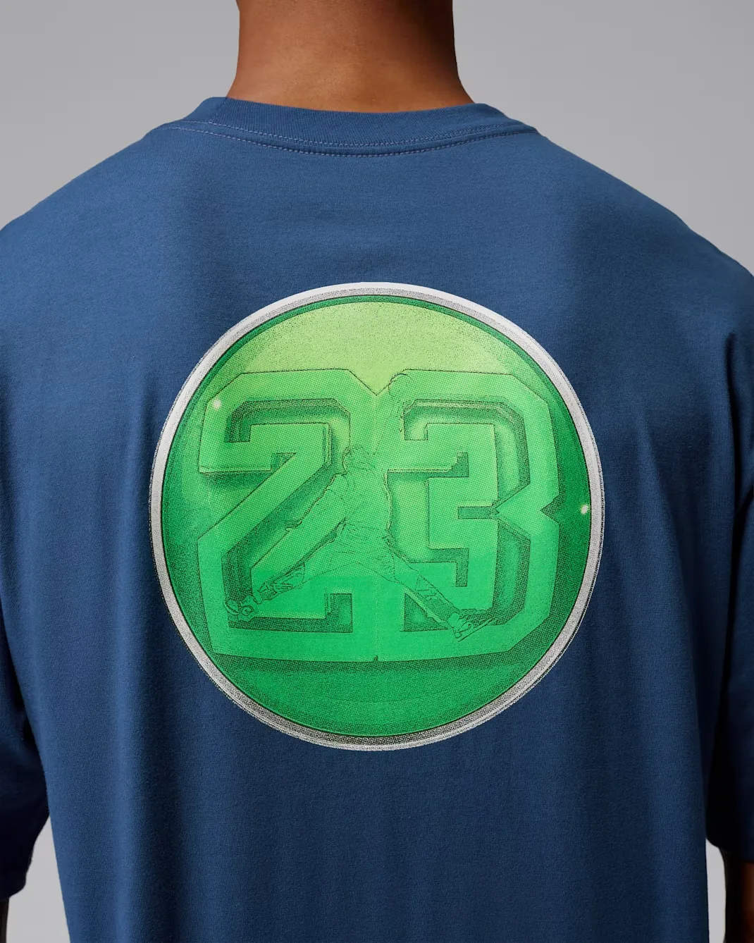 Close-up of the AJ13 holographic-inspired graphic on the back of the Jordan AJ13 Graphic T-Shirt.
