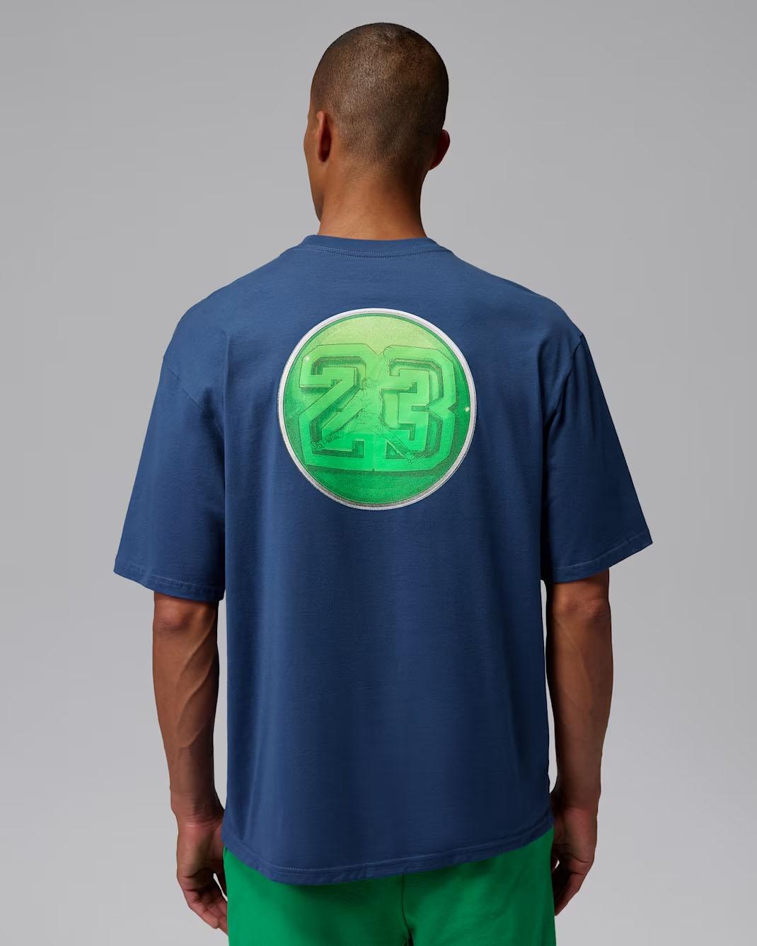 Back view of the Jordan AJ13 Graphic T-Shirt featuring a large holographic-inspired AJ13 graphic.