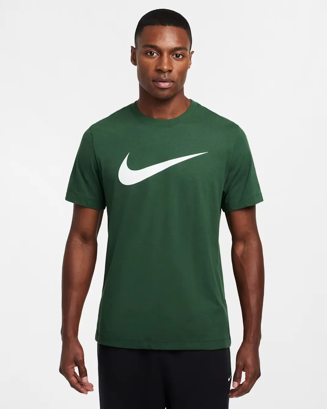 Front view of the Nike Sportswear Swoosh T-Shirt in Fir Green featuring a large white Nike Swoosh graphic.