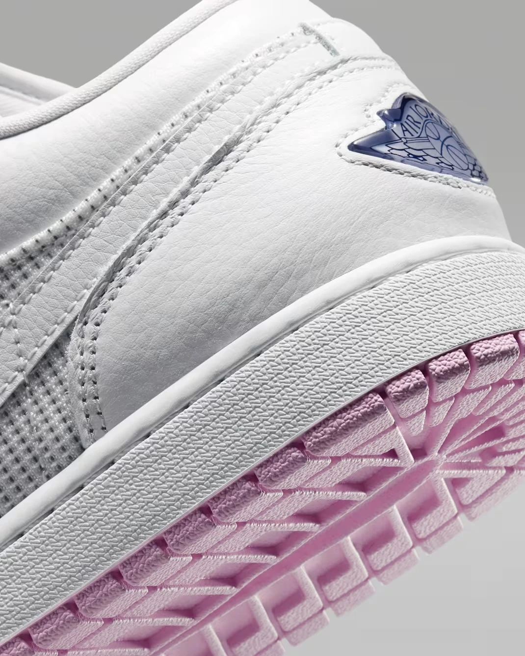 Close-up of the heel and pink outsole on the Air Jordan 1 Low "Comic."