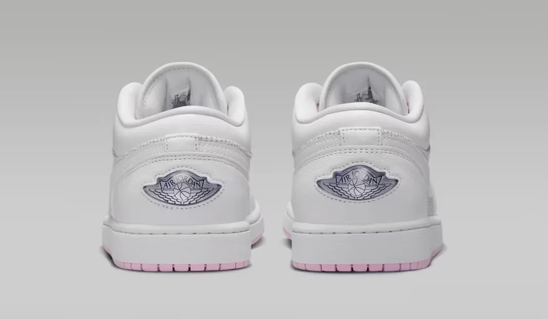 Rear heel view of the Air Jordan 1 Low "Comic" featuring the Wings logo.