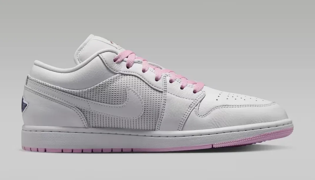 Medial side view of the Air Jordan 1 Low "Comic" featuring Summit White, Light Arctic Pink and Silver.