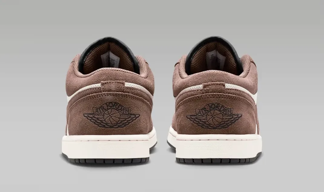 Rear heel view of the Air Jordan 1 Low "Palomino/Phantom" with the embroidered Wings logo.