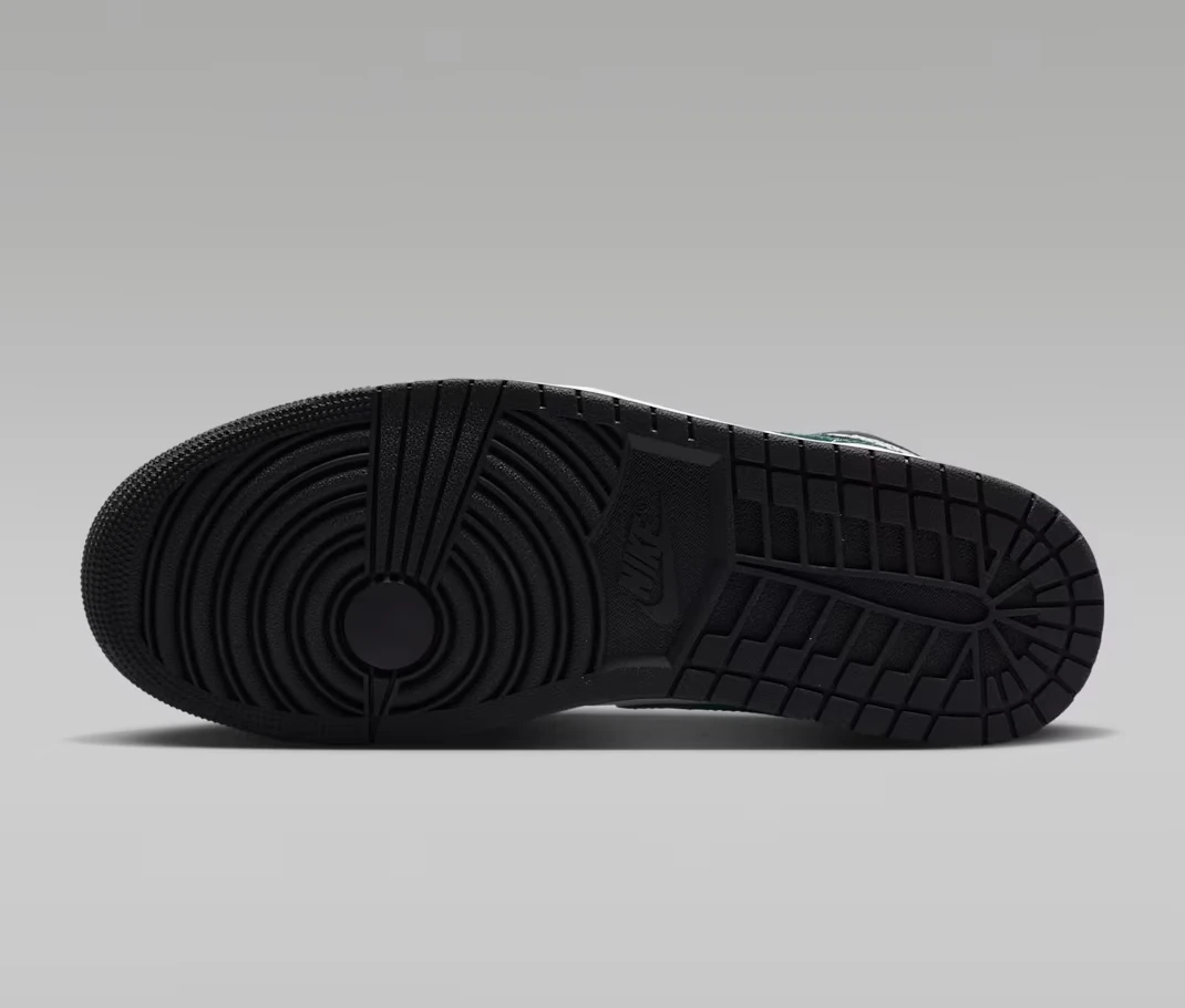 Outsole view of the Air Jordan 1 Mid "Black/Gorge Green" sneaker.