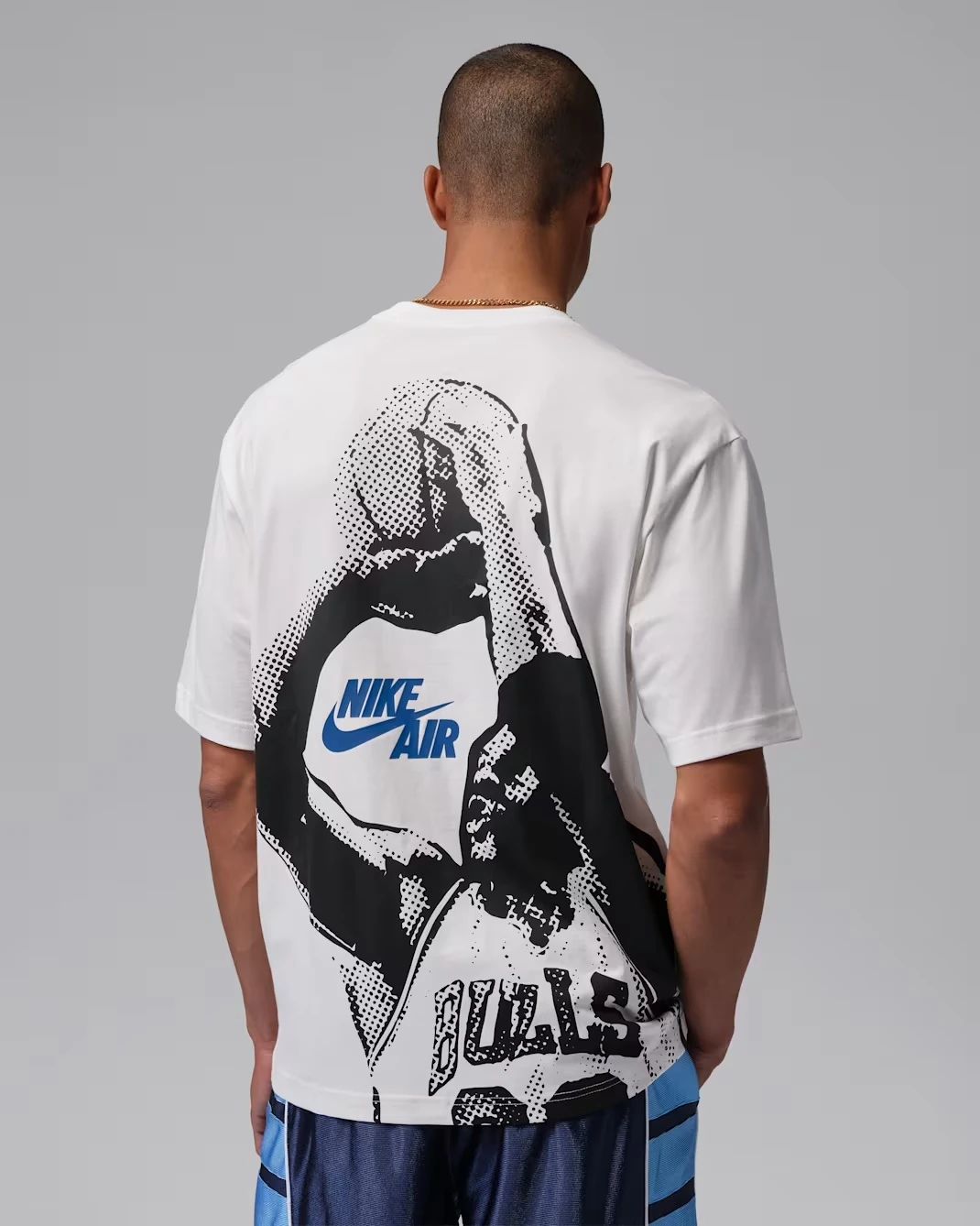Back view of the Jordan Brooklyn 85 T-Shirt in Sail with Black and Game Royal graphic, matching the Air Jordan 13 Flint (2026).