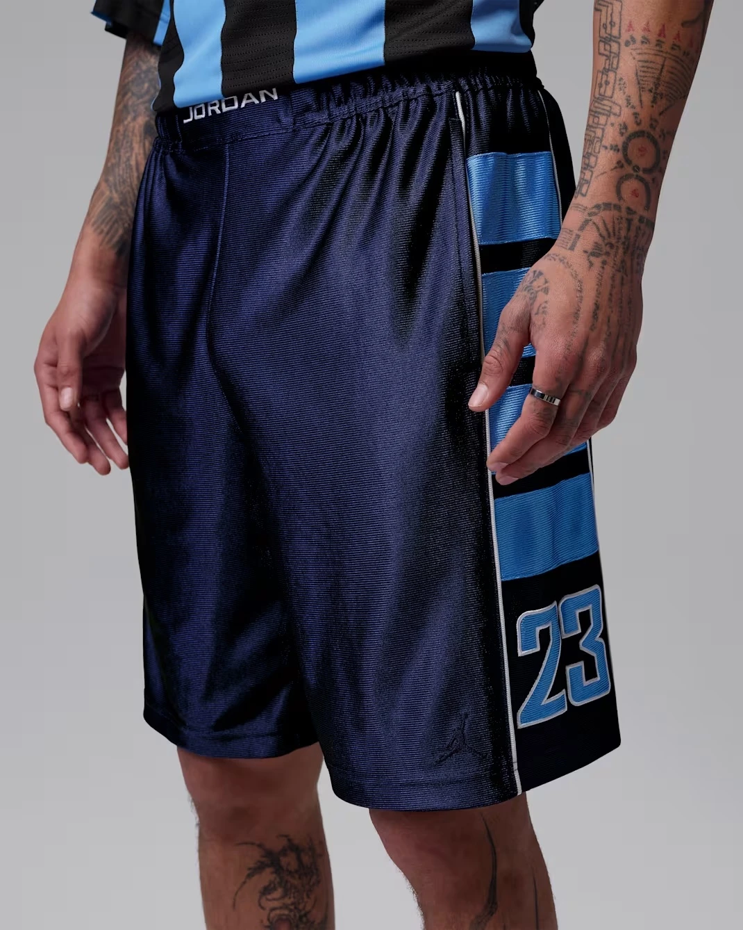 Jordan Brooklyn Cat Scratch Shorts in Midnight Navy matching the Air Jordan 13 Flint (2026).