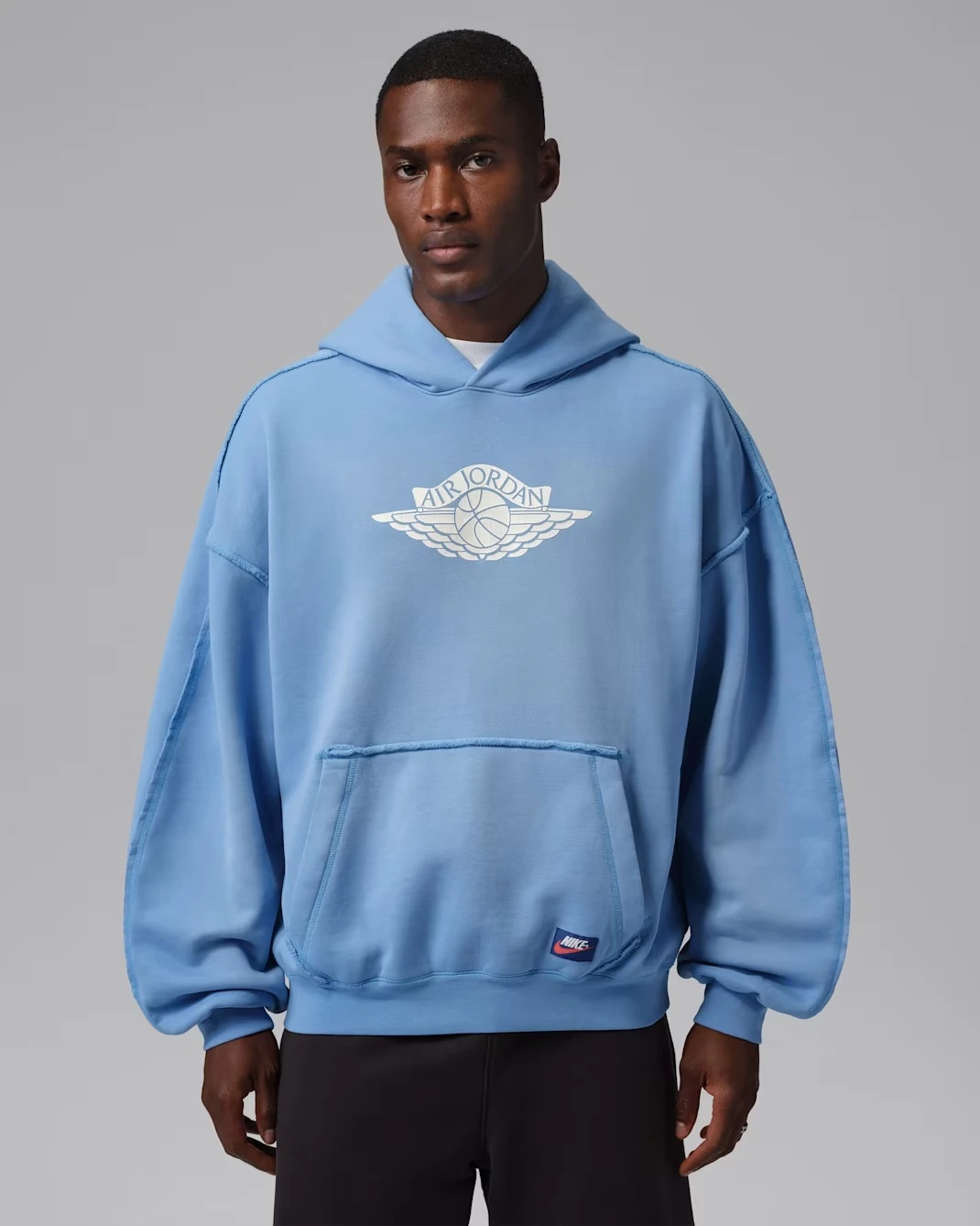 Jordan Flight Wings Fleece Hoodie in University Blue matching the Air Jordan 13 Flint (2026).