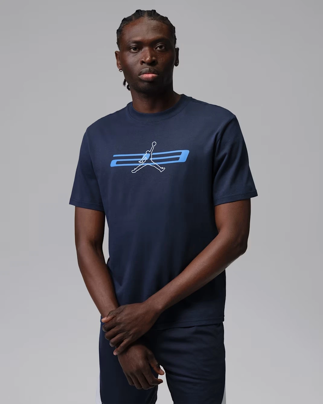 Jordan Sport Dri-FIT T-Shirt in Midnight Navy with Jumpman logo matching the Air Jordan 13 Flint (2026).