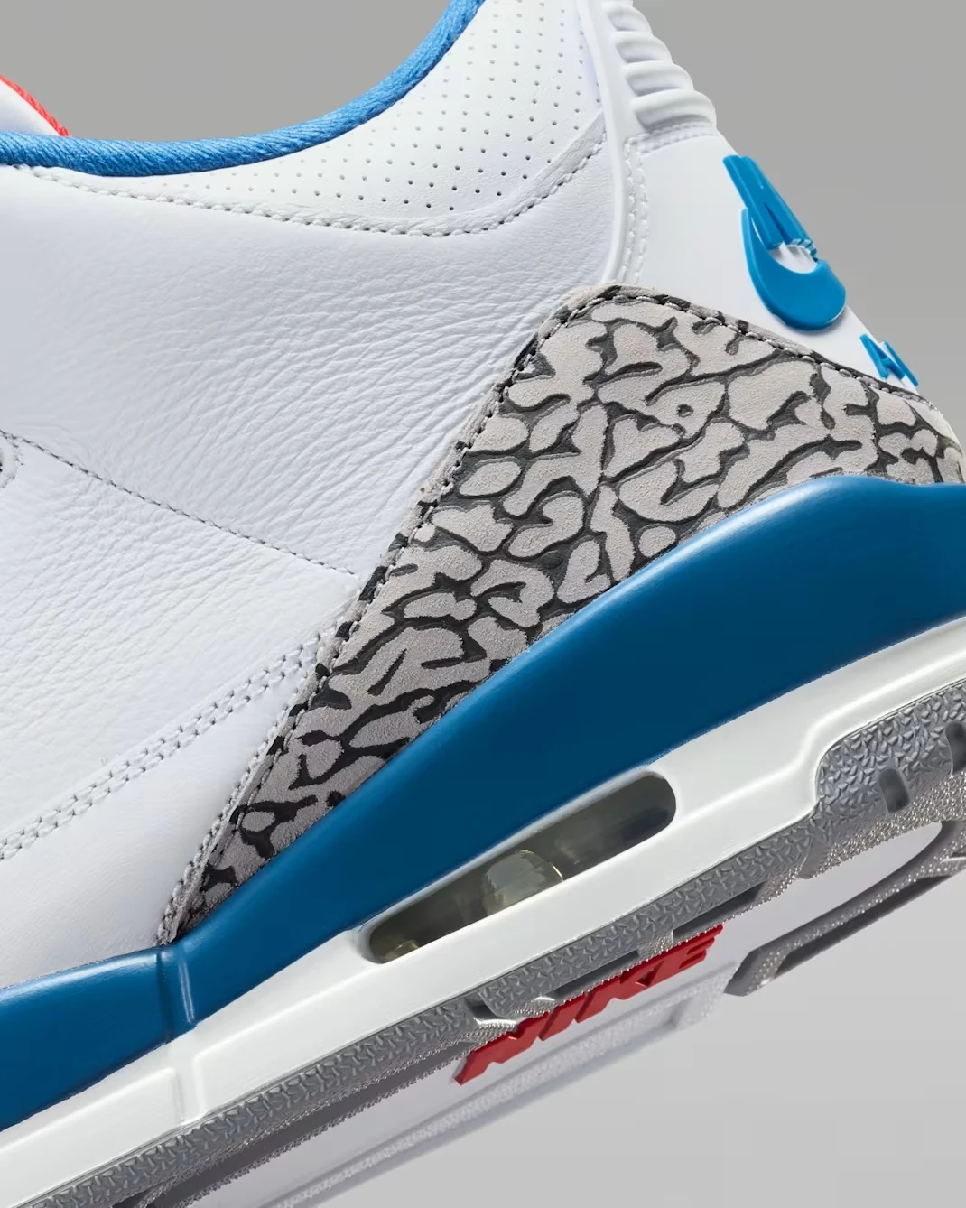 Close-up of the Air Jordan 3 True Blue (2026) elephant print overlay and visible Air unit.