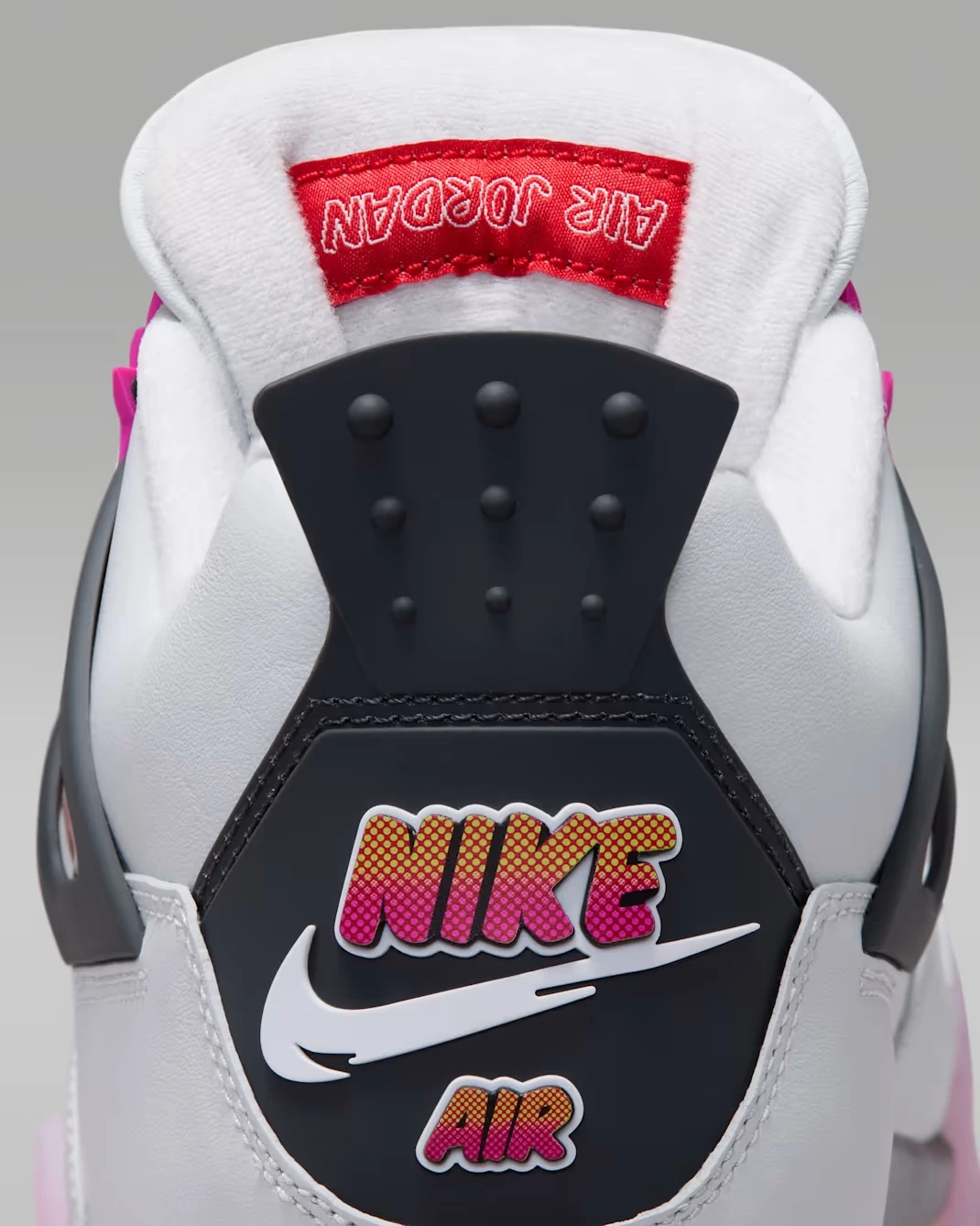 Close-up of the comic-inspired Nike Air heel logo on the Air Jordan 4 Comic.