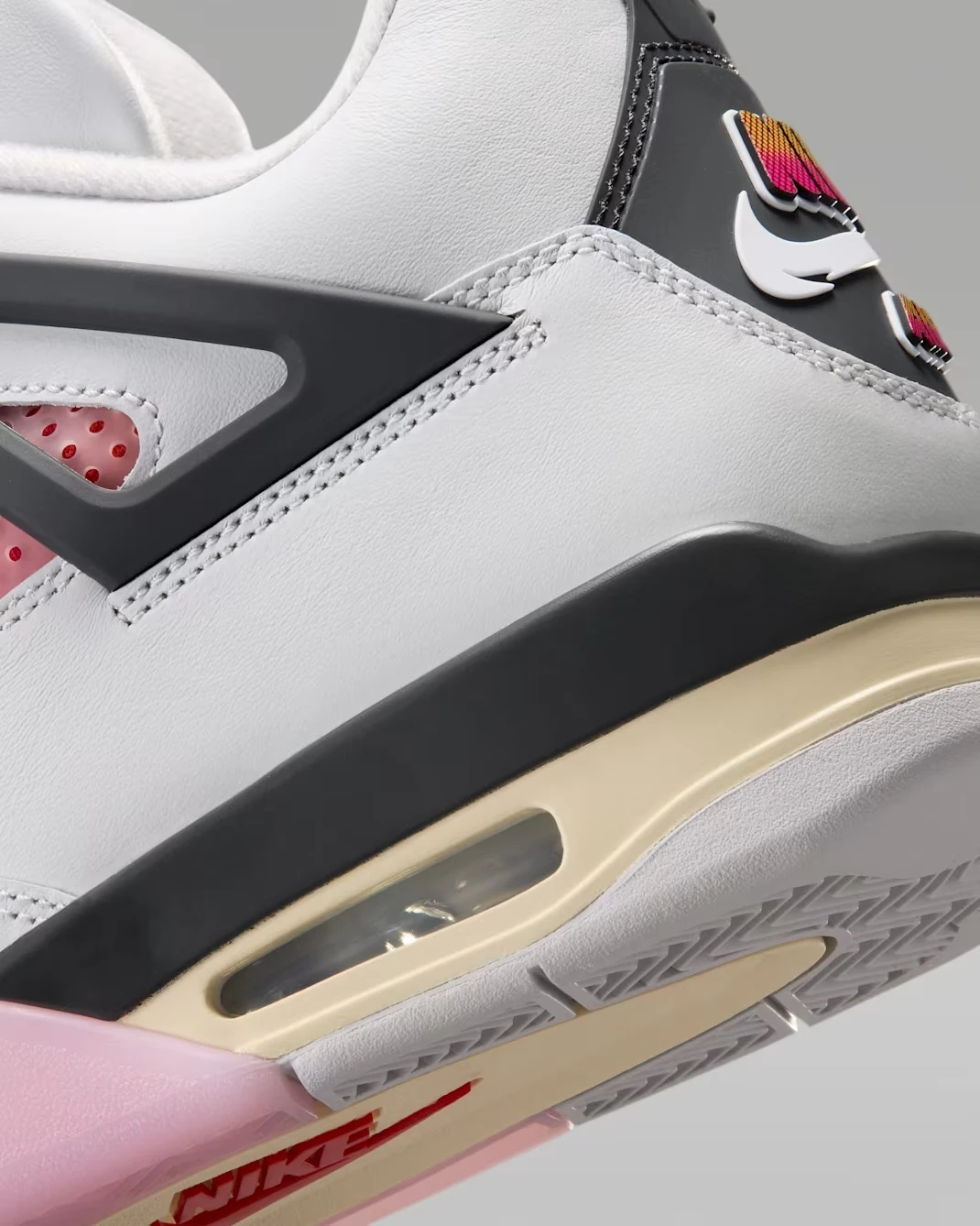 Close-up of the Air Jordan 4 Comic heel, visible Air unit and Sail midsole.