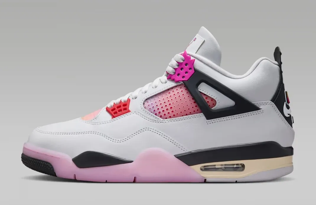 Medial side view of the Air Jordan 4 Comic sneaker in Off White, Anthracite and Fire Pink.